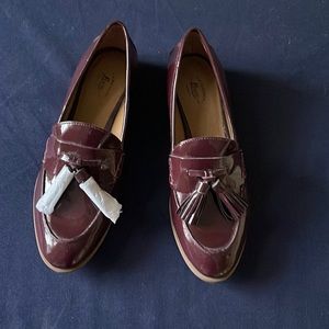 Brand New burgundy, patent leather loafers size 8M.